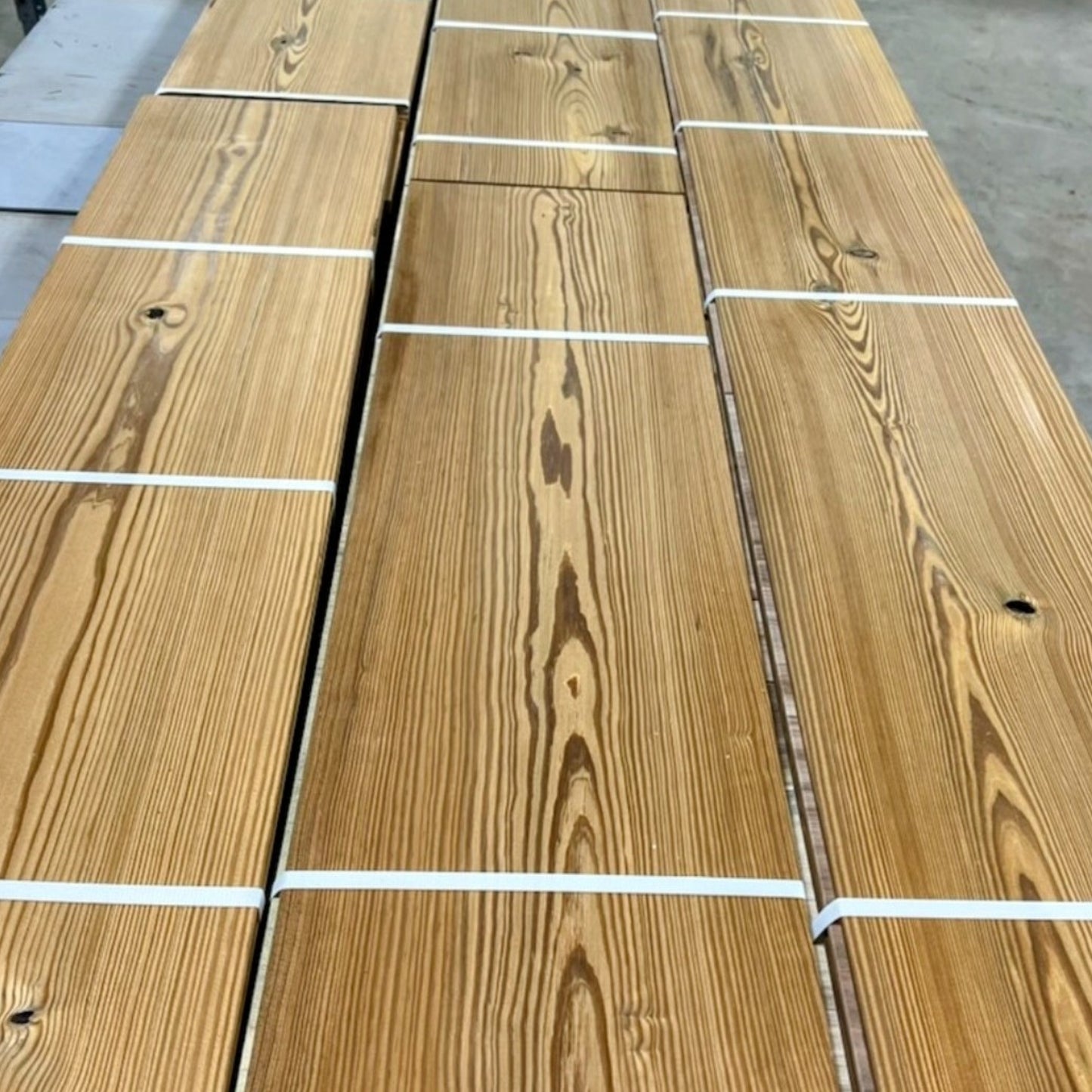 Waterproof Antique Heart Pine flooring — 100% solid wood for concrete slabs, basements, showers, and radiant heat. Thermally modified with just heat and steam