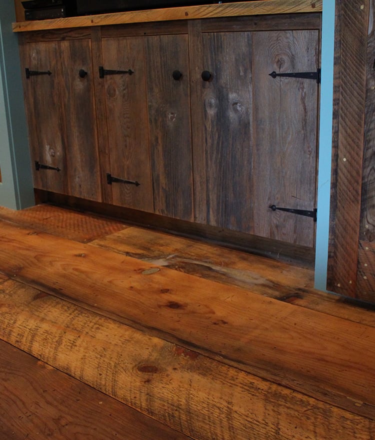 Close-up of thermally modified reclaimed White Oak flooring — dirty top with circular saw marks and skip-planed surface