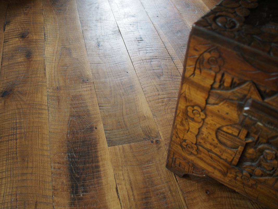 100% solid reclaimed White Oak flooring — waterproof, thermally modified, built for concrete slabs and radiant heat